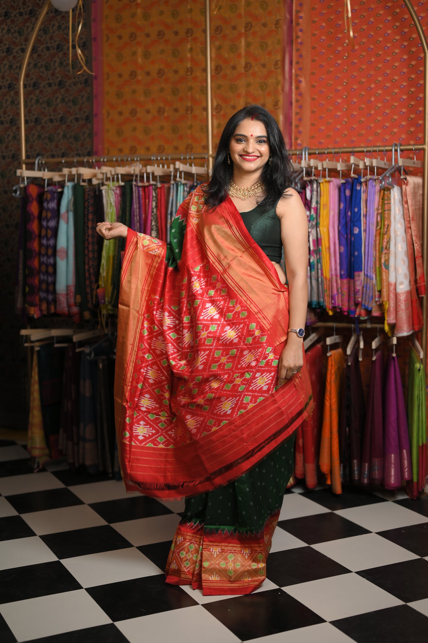 Dark Green body Red border saree