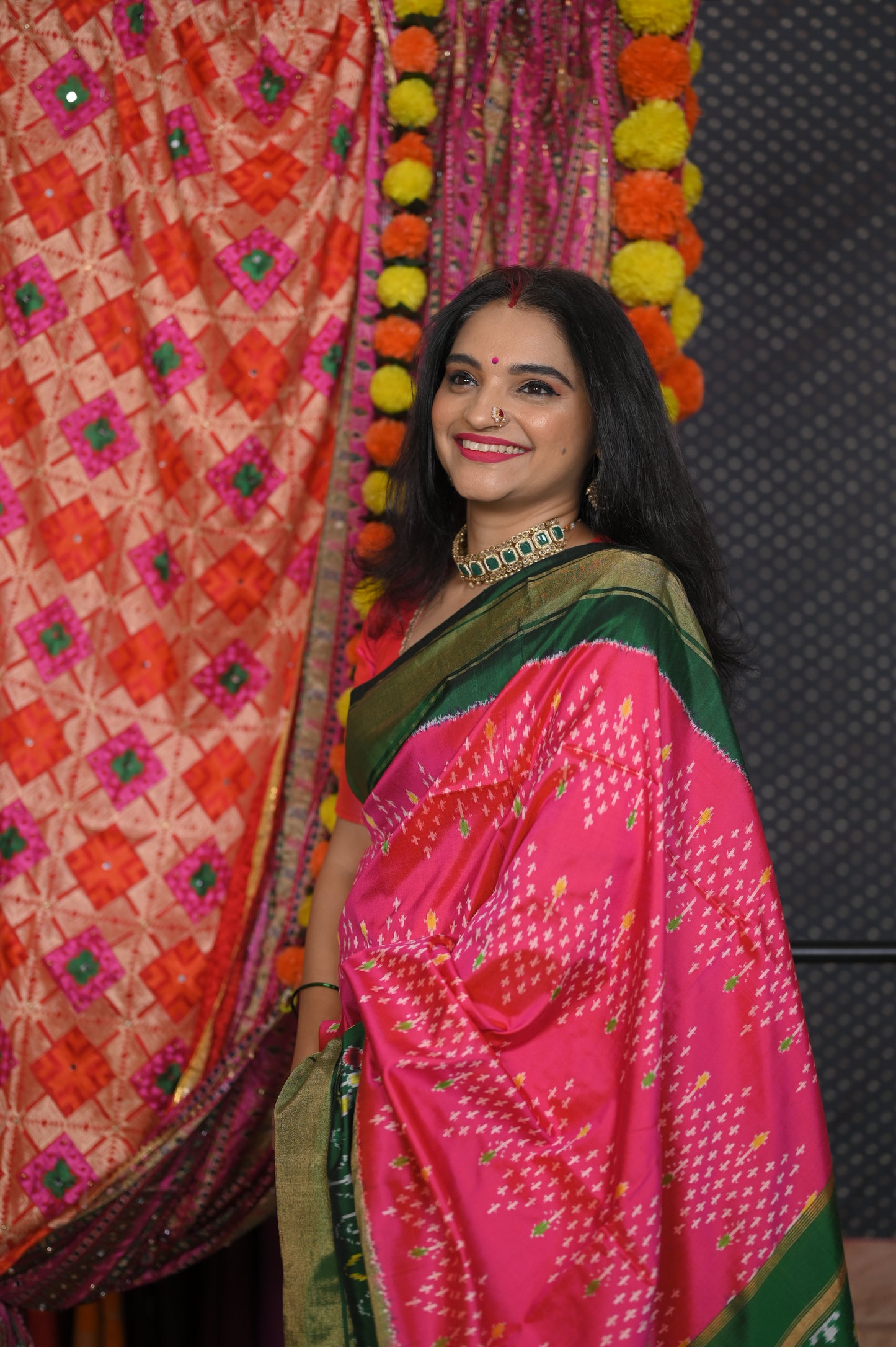 Pink body with Green border saree
