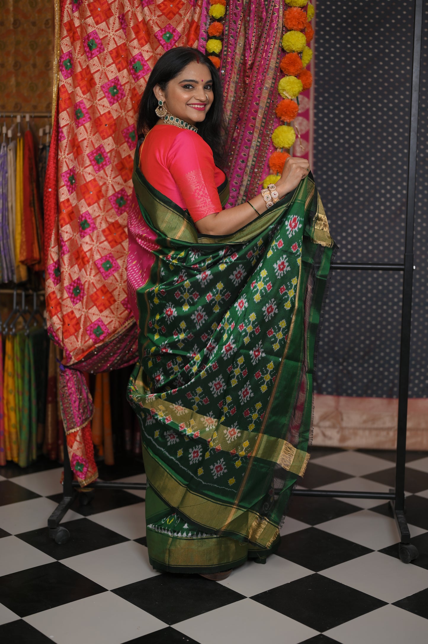 Pink body with Green border saree