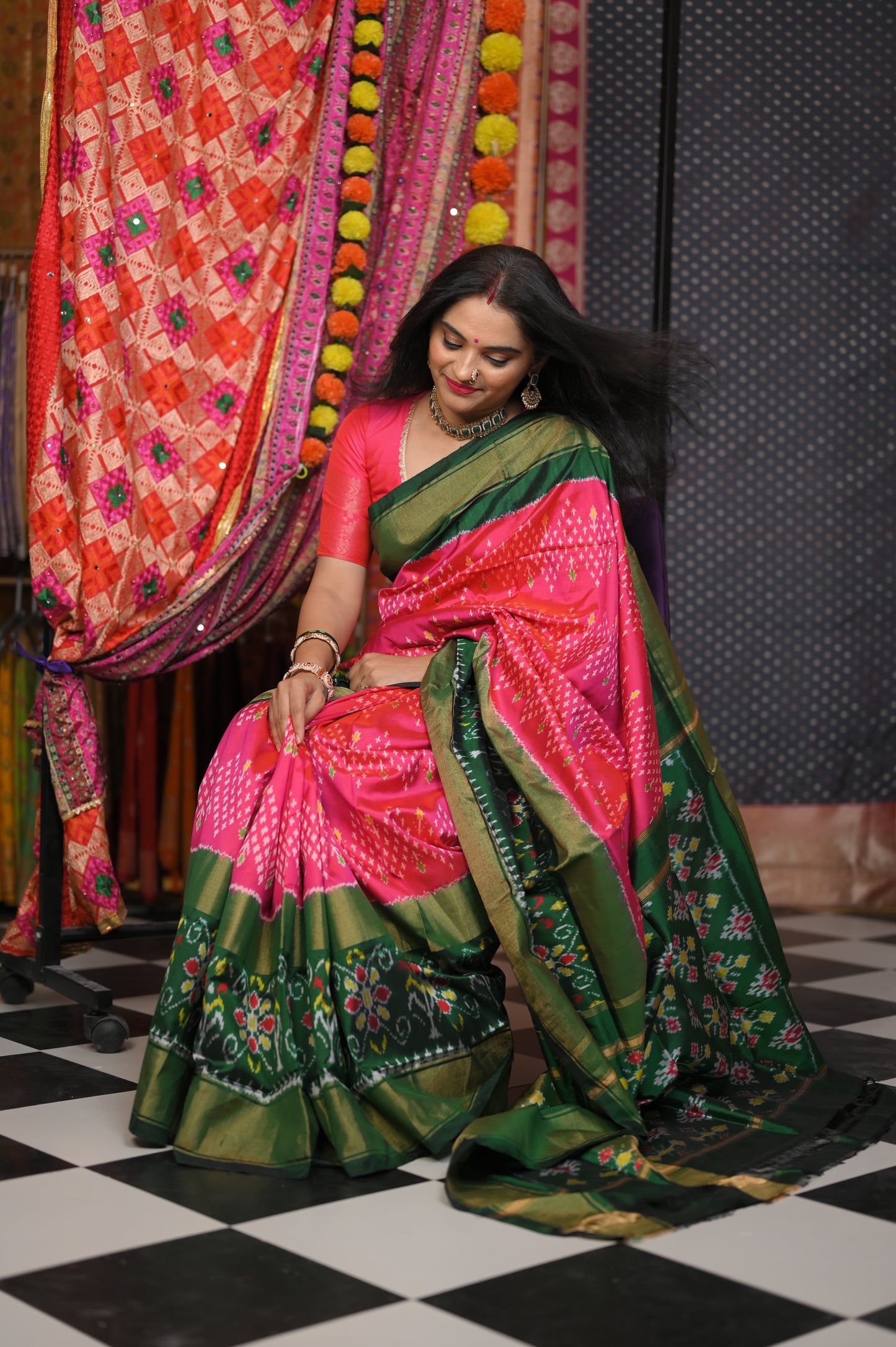 Pink body with Green border saree