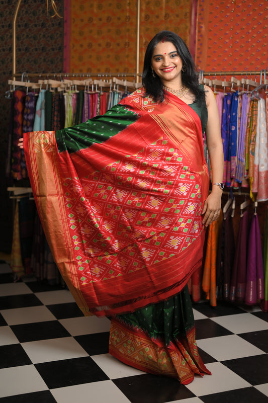 Dark Green body Red border saree