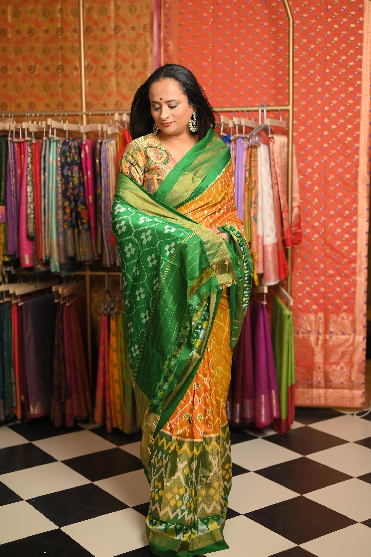 Mustard yellow body with Green border Saree