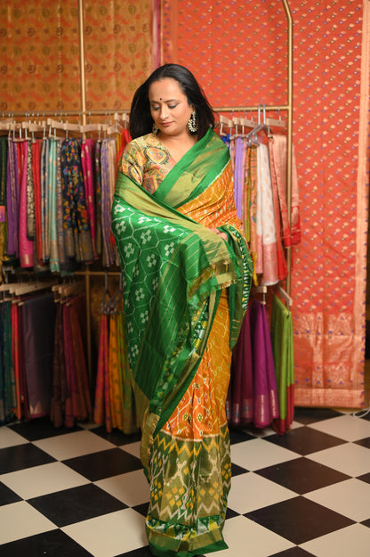 Mustard yellow body with Green border Saree