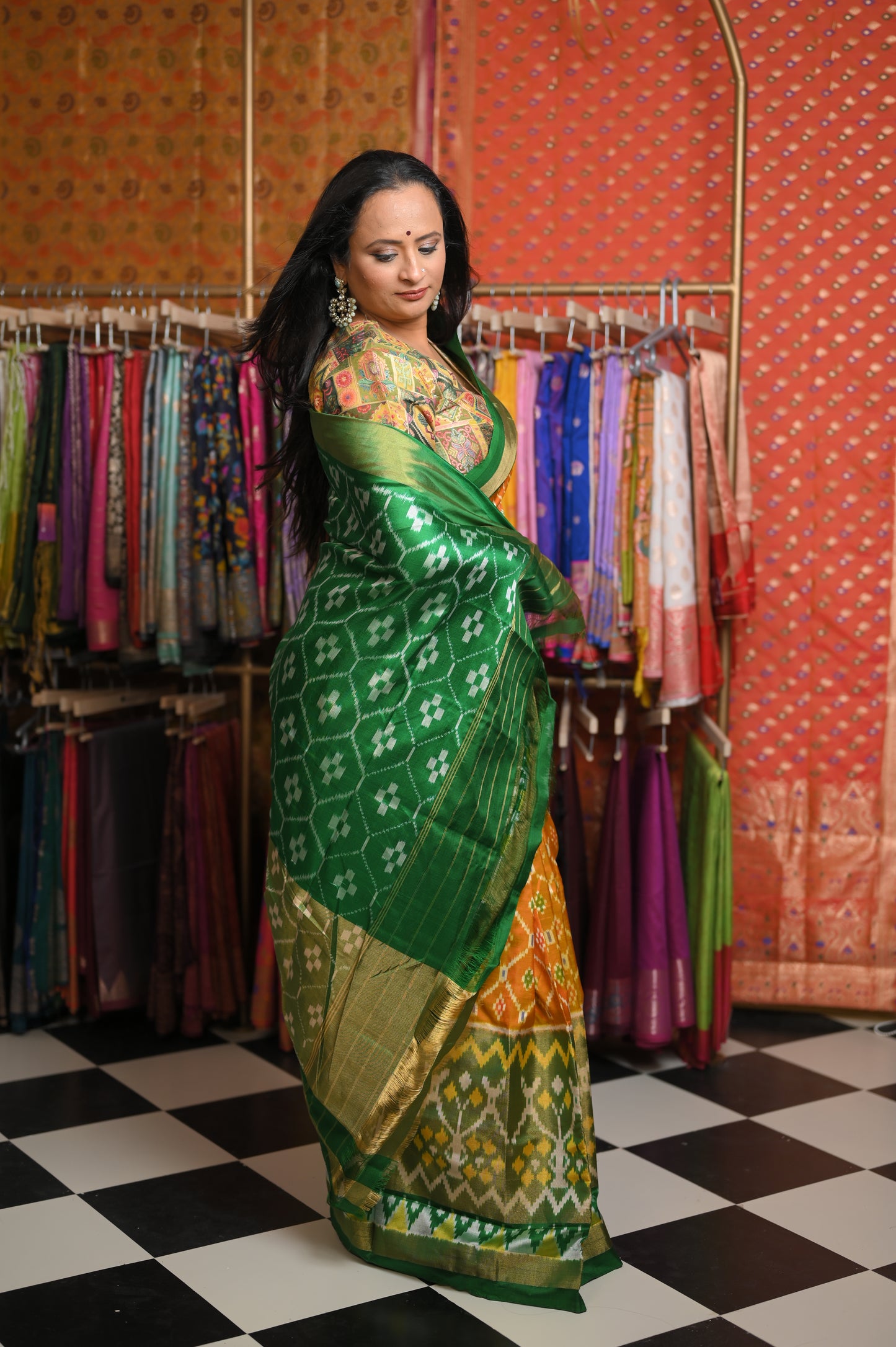 Mustard yellow body with Green border Saree